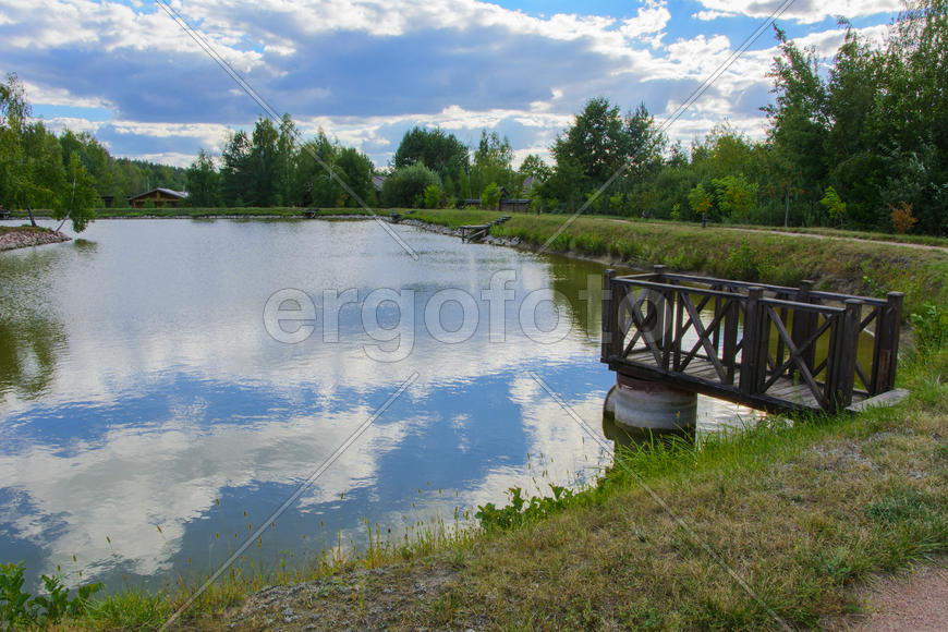 Island with a bridge on a private lake