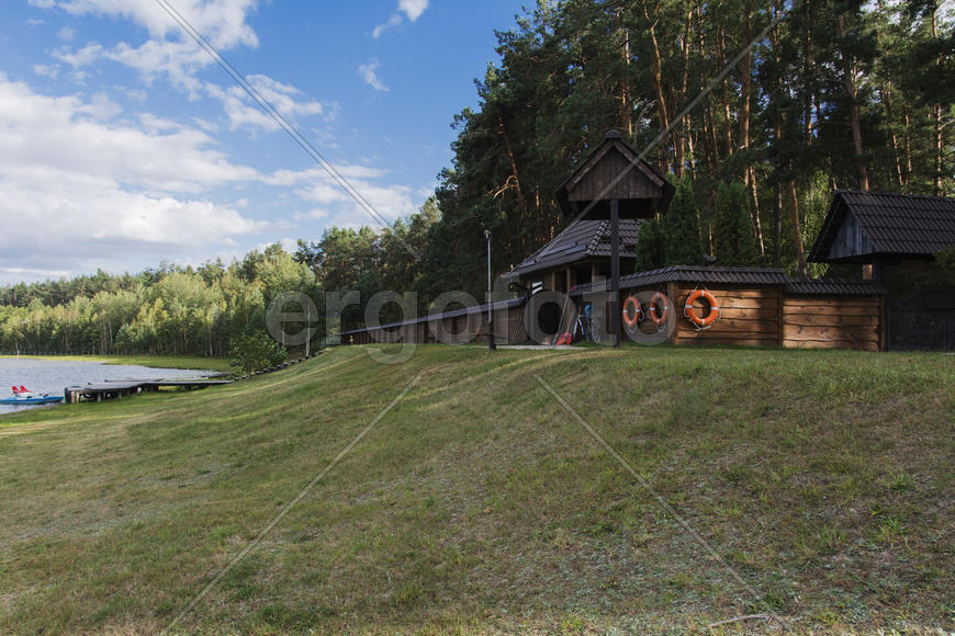 Wooden fence enclosing the recreation area on the lake