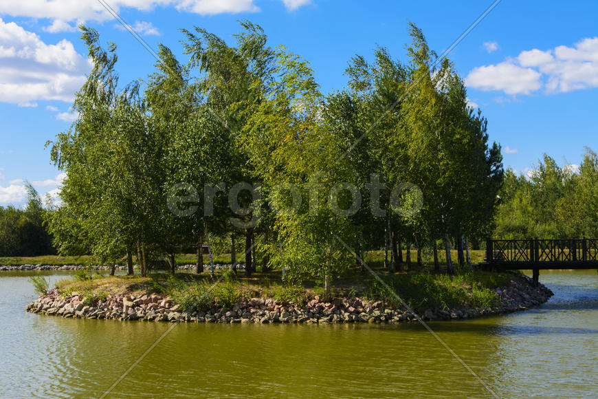 Island with a bridge on a private lake