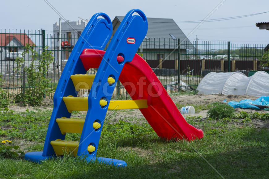 Children's slide in the yard of a private house.