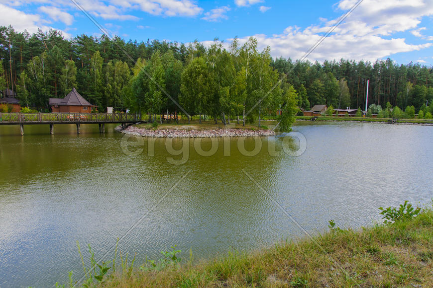 Island with a bridge on a private lake