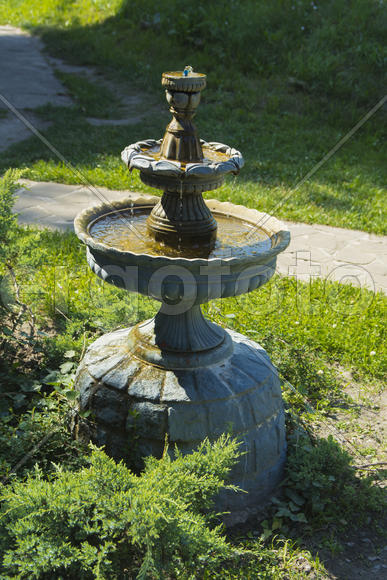 Decorative fountain in the courtyard of a private house