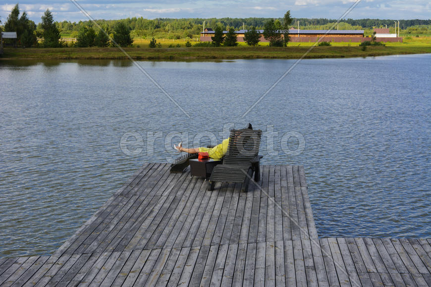 The bridge for recreation and fishing on a private lake.