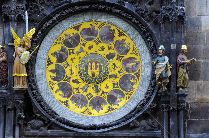 Old clock on the city tower in the city center.