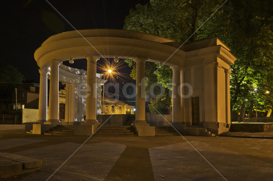 Illuminated Arch in night city park