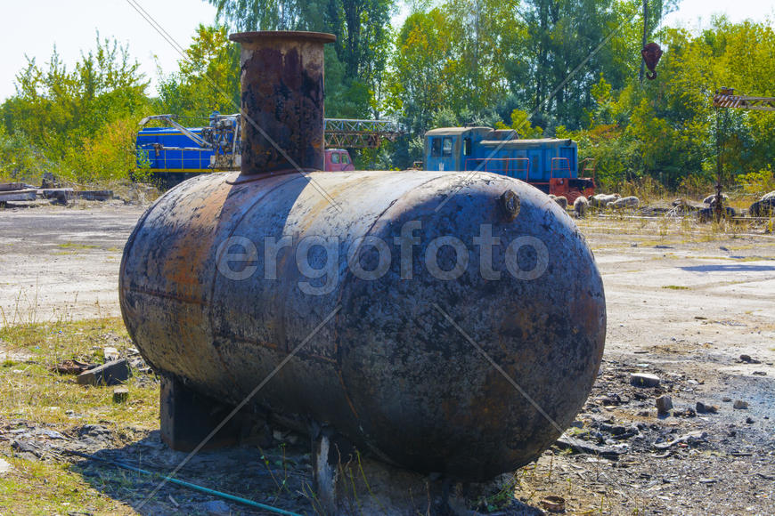 Old rusty container at an abandoned factory in the industrial zone