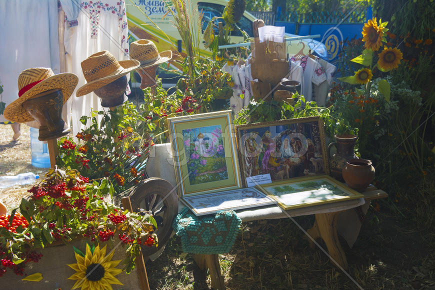 Skilled handicrafts. Fruits and vegetables at the fair