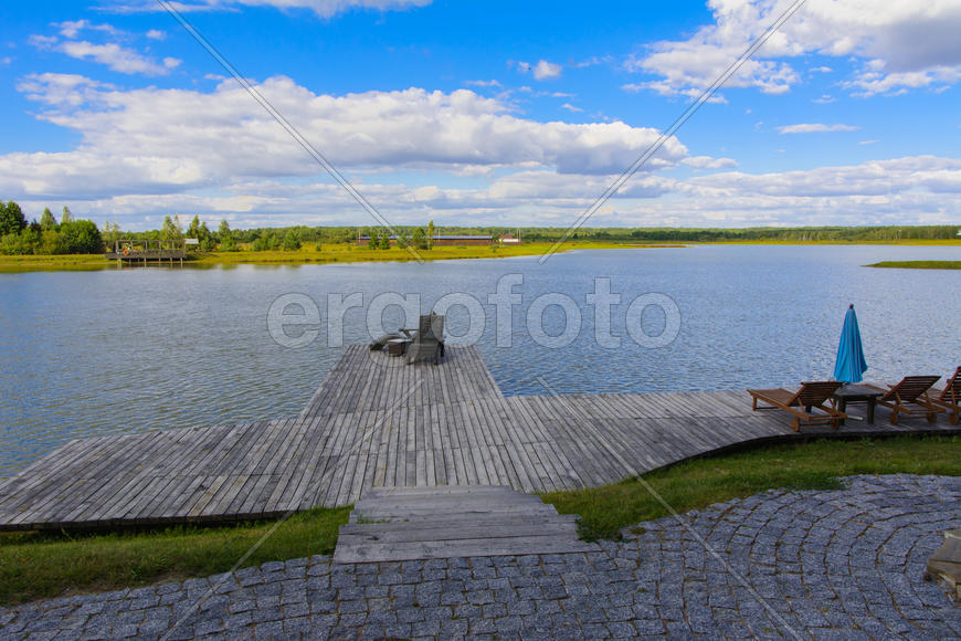 The bridge for recreation and fishing on a private lake.