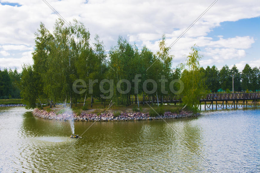 Island with a bridge on a private lake