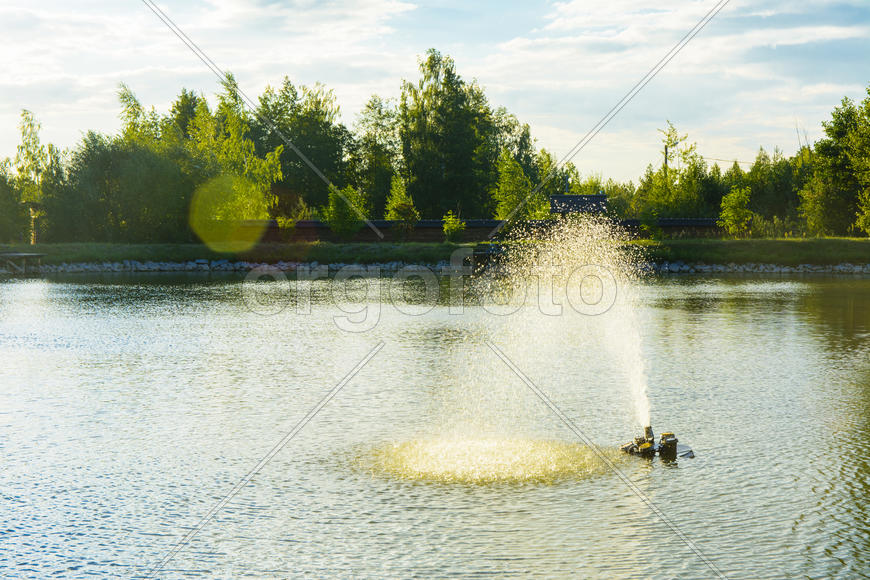 The fountain on the lake. Family fun and fishing