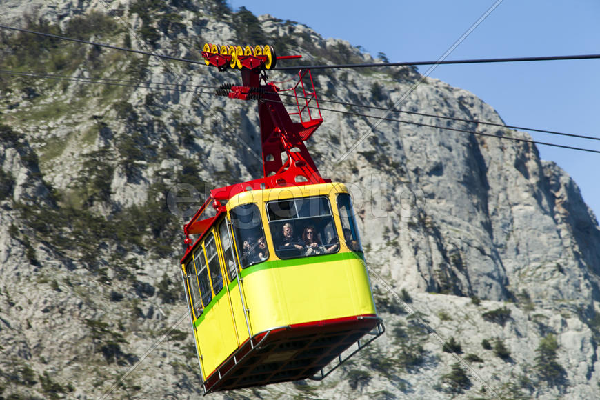 Ropeway on the high mountain in the sunny day