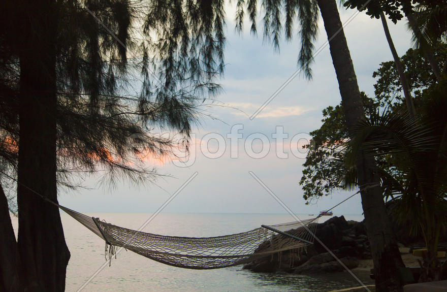 The seashore at sunrise absolutely silent waiting for the sun and people
