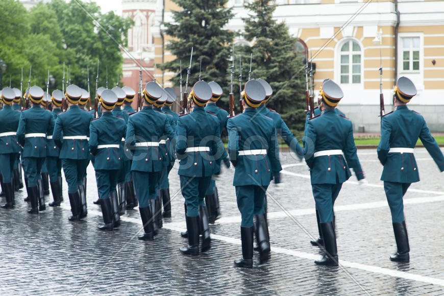 Soldiers on march in smart regimentals go for parade