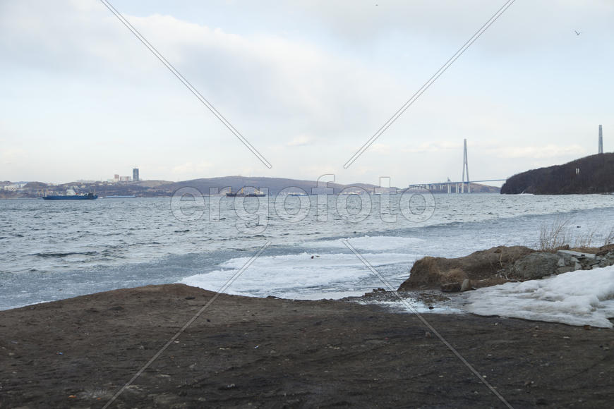 Ice at the sea in the early spring yet not all has descended