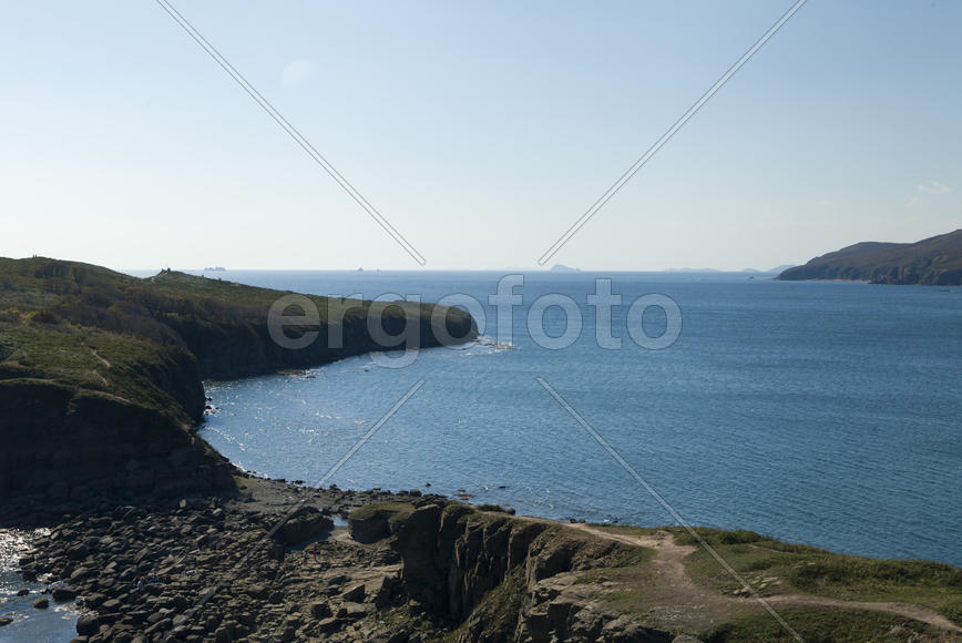 The sea under the bright autumn sun prepares for winter