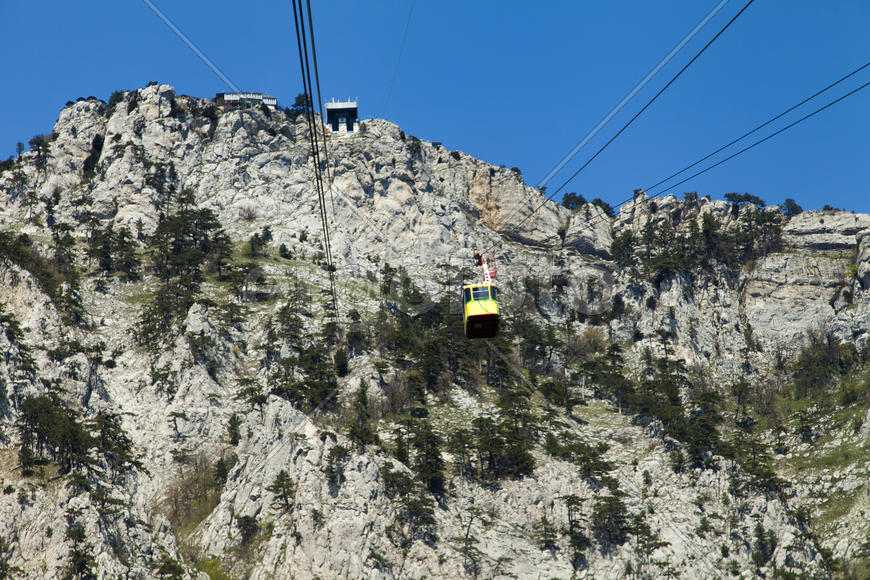 Ropeway on the high mountain in the sunny day
