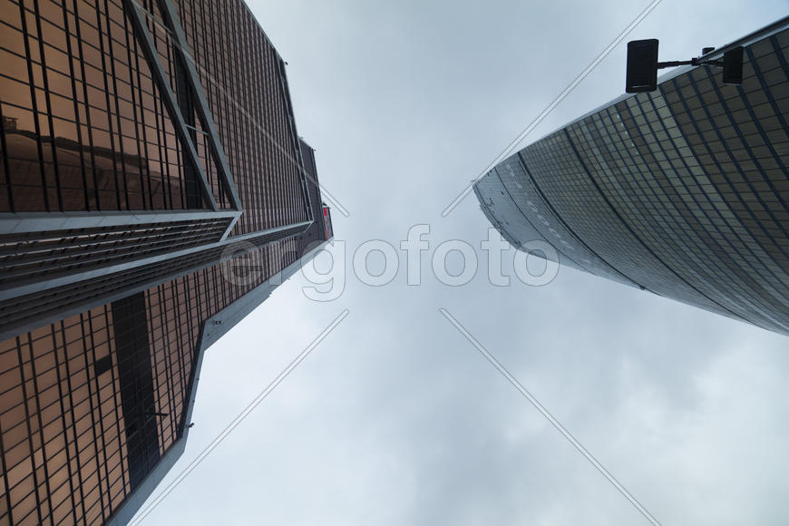 Skyscrapers last in the sky and hang over the head