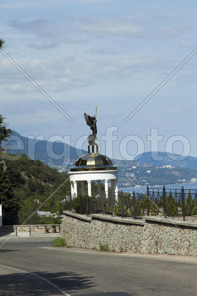 Orthodox church in beams of a bright sun against the blue sky
