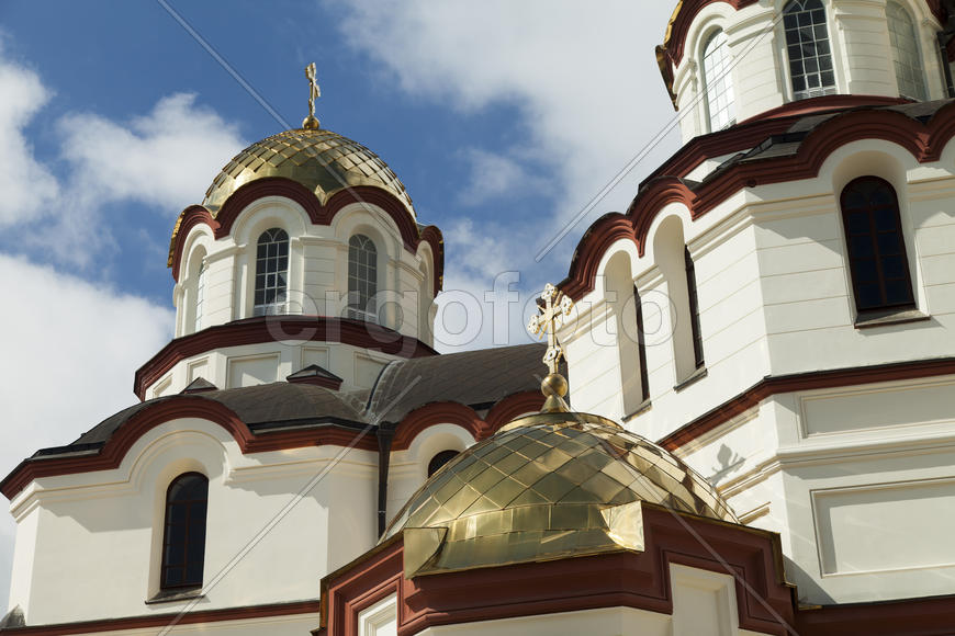 The orthodox church sparkles on the sun the gold domes