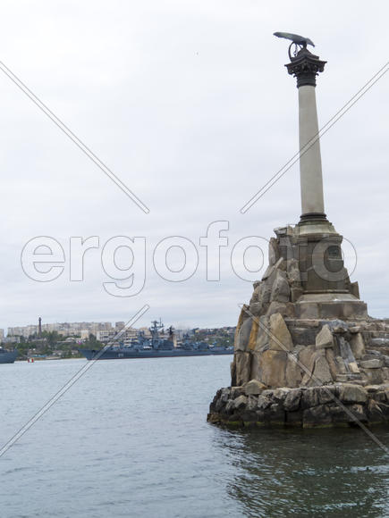 Monument to the flooded Russian ships in a bay