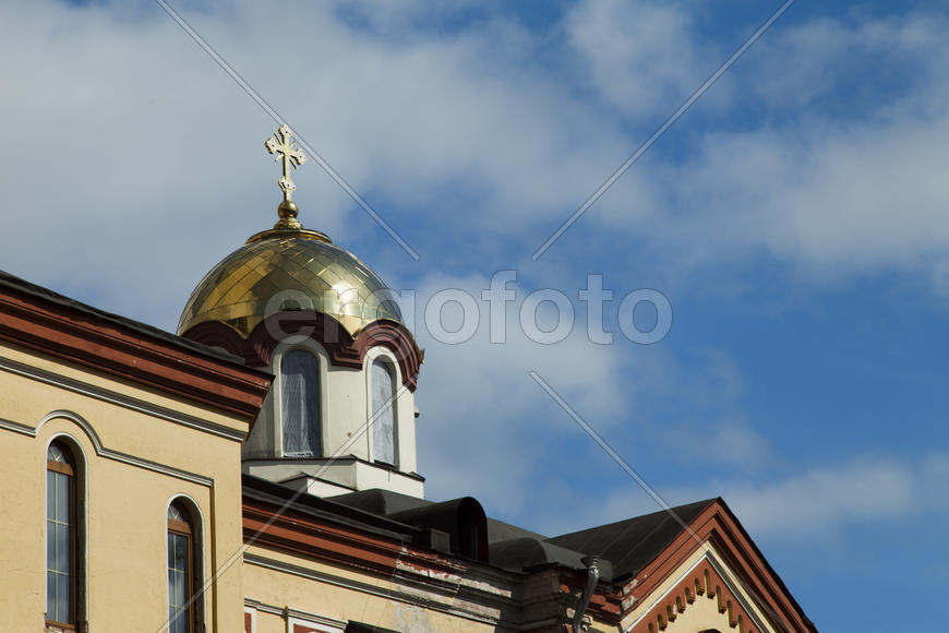 The orthodox church sparkles on the sun the gold domes