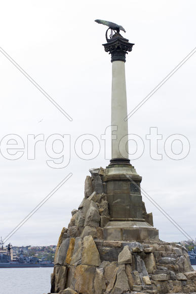 Monument to the flooded Russian ships in a bay