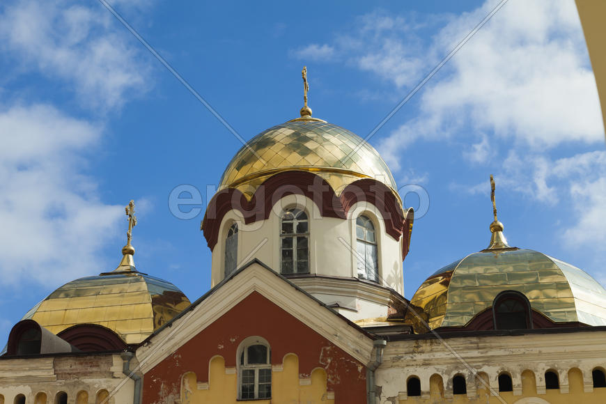 The orthodox church sparkles on the sun the gold domes