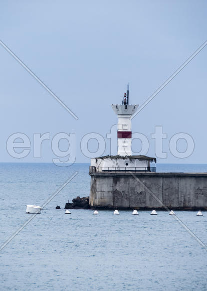 Sea bay in the city in cloudy weather