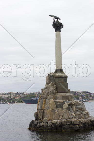 Monument to the flooded Russian ships in a bay