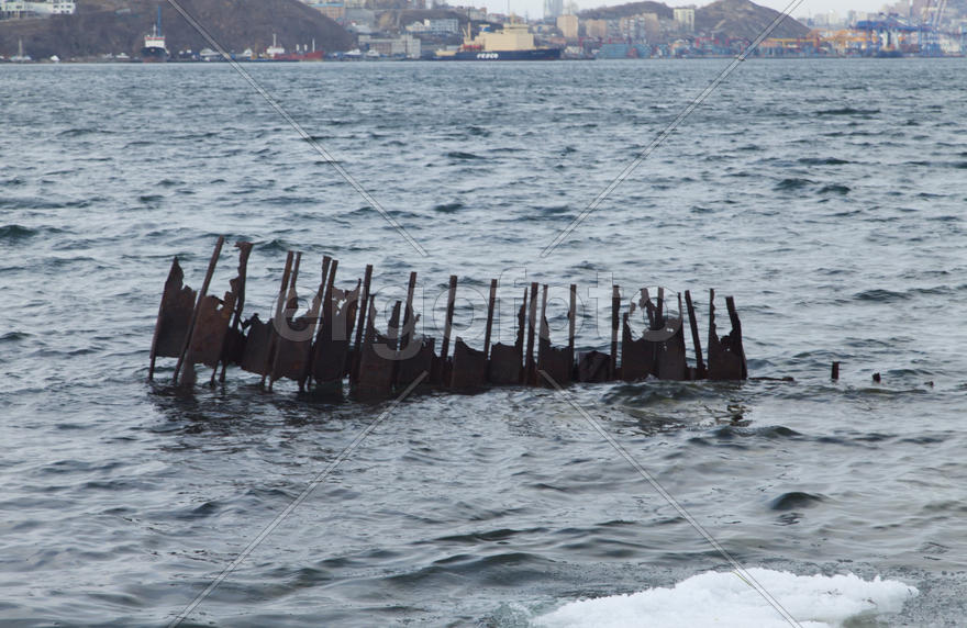 Ice at the sea in the early spring yet not all has descended