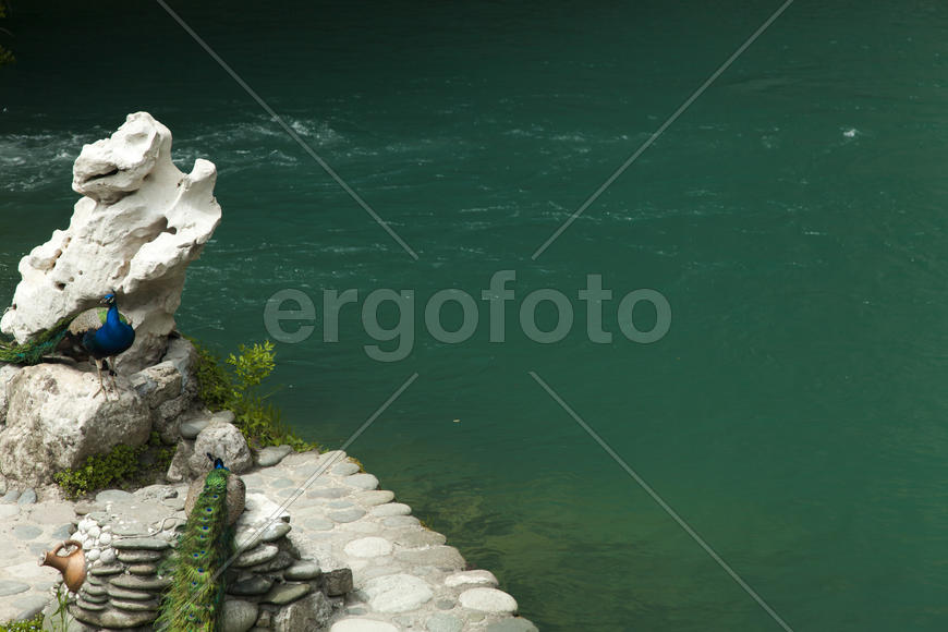The blue lake lies highly in mountains and it very cold