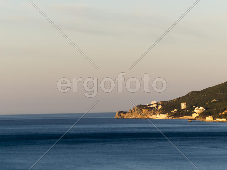 The bay is at sunrise lit with the soft morning sun