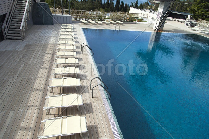 The swimming pool under beams of the sun is ready to competitions and rest