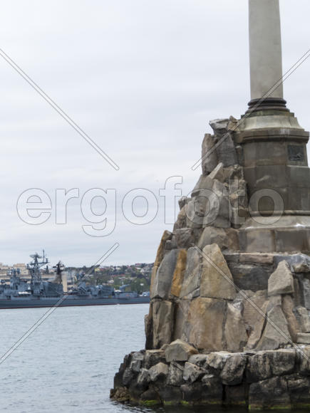 Monument to the flooded Russian ships in a bay