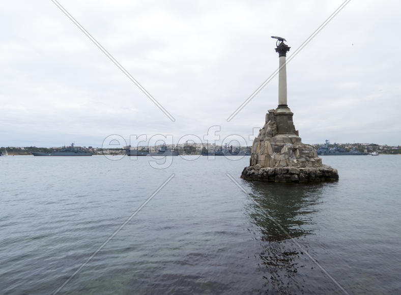 Monument to the flooded Russian ships in a bay