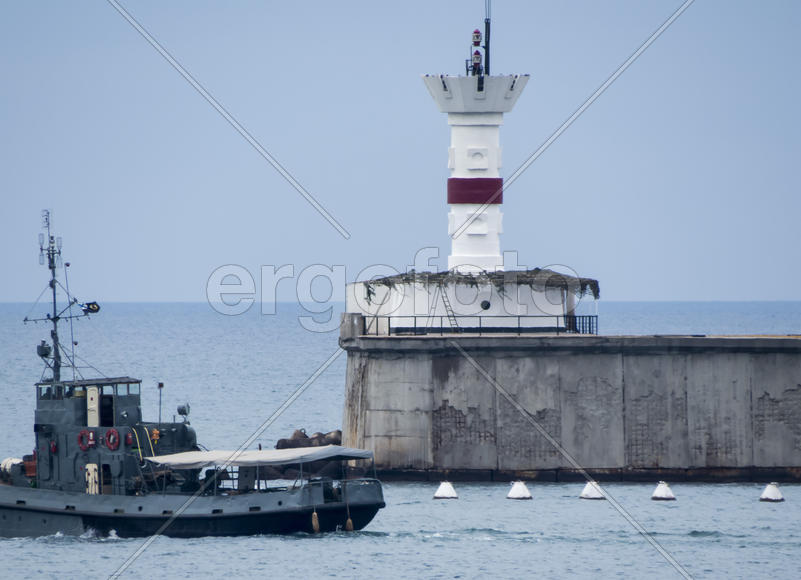 Sea bay in the city in cloudy weather