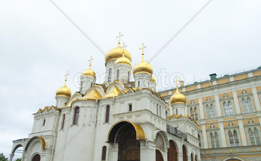 The orthodox church in cloudy weather lights the world with the domes