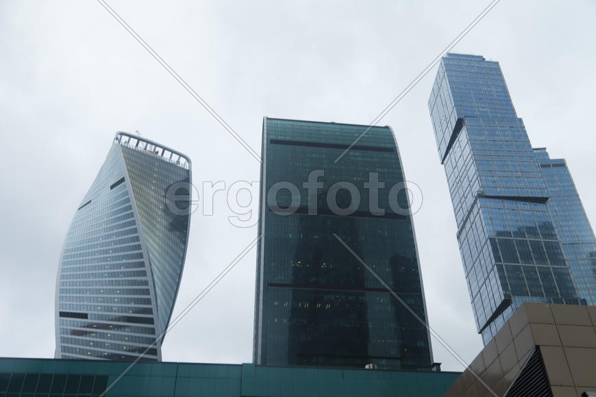 Skyscrapers last in the sky and hang over the head