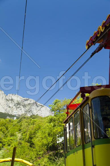 Ropeway on the high mountain in the sunny day