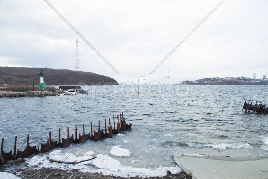 Ice at the sea in the early spring yet not all has descended