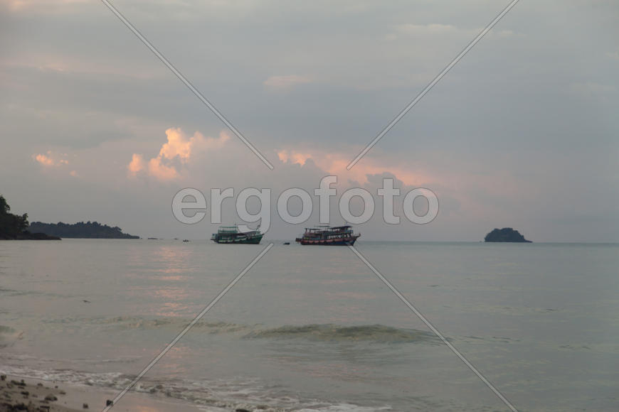 The seashore at sunrise absolutely silent waiting for the sun and people
