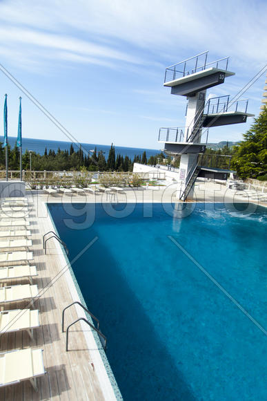 The swimming pool under beams of the sun is ready to competitions and rest