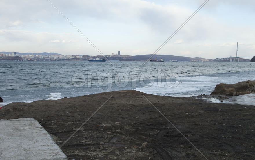Ice at the sea in the early spring yet not all has descended