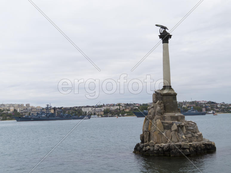 Monument to the flooded Russian ships in a bay