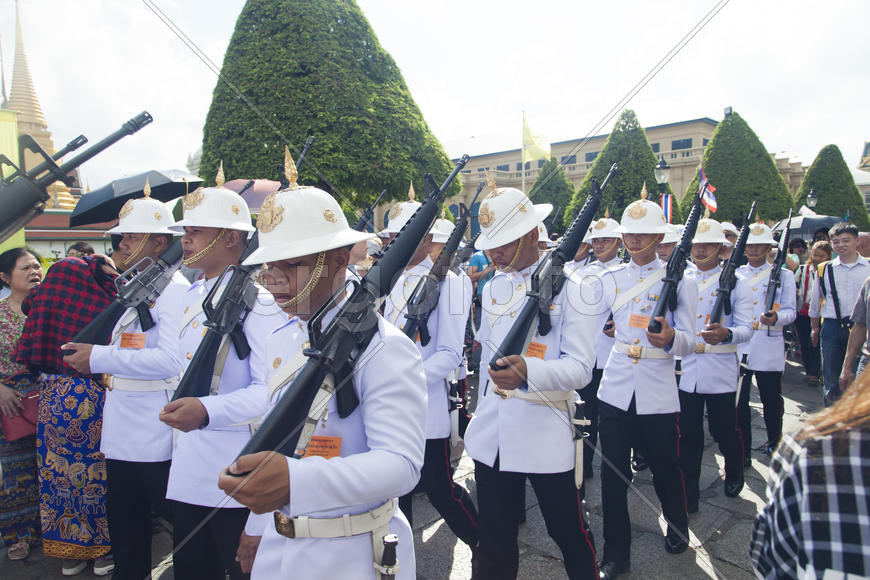 Royal guard on march in an environment of curious crowd
