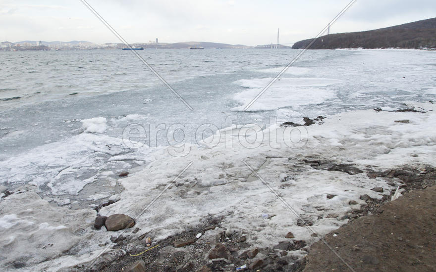 Ice at the sea in the early spring yet not all has descended