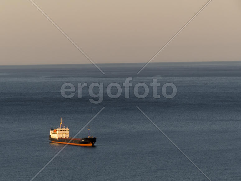 The bay is at sunrise lit with the soft morning sun