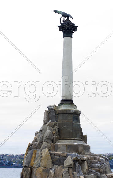 Monument to the flooded Russian ships in a bay
