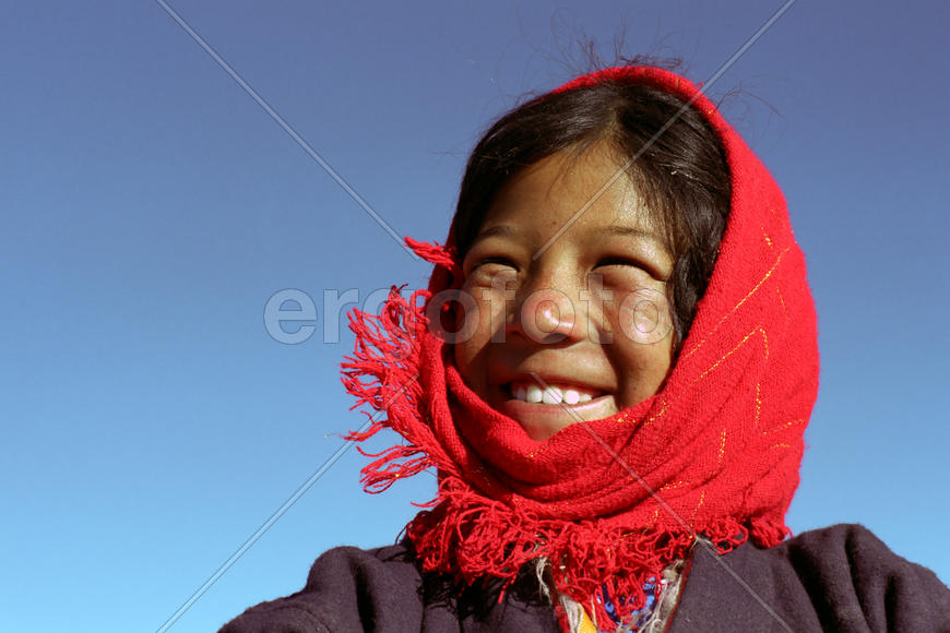 Улыбка тибетской девочки