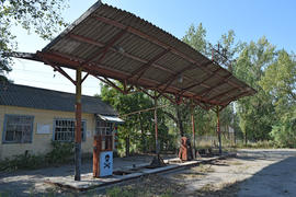 The old thrown gas station. Structure of times of socialism